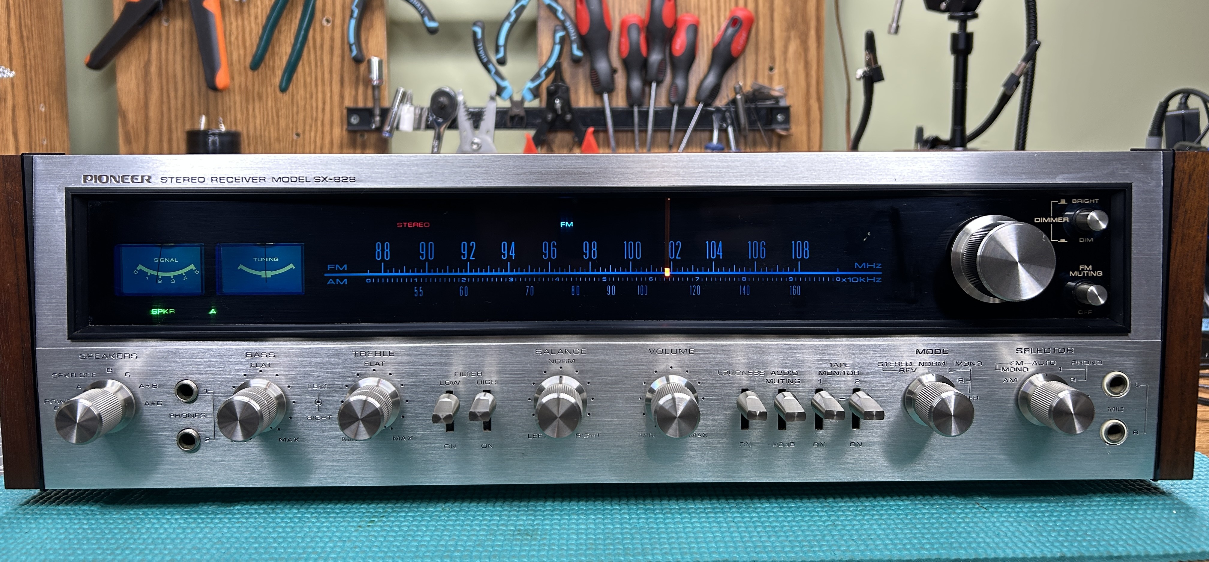 Restored Pioneer SX-828 with its original replaced components displayed on the ECB Audio Labs bench